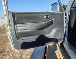 Обшивка двери км-т (карты) для Mitsubishi Pajero Mini II (1998—2012)  запчасти бу