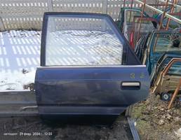 Дверь задняя левая для Mazda 626 GD (1987—1996)  запчасти бу