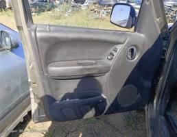 Обшивка двери км-т (карты) для Jeep Cherokee III (2001—2004)  запчасти бу