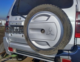Кожух запасного колеса для Mitsubishi Pajero Mini II (1998—2012)  запчасти бу