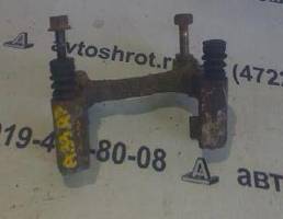 Скоба суппорта заднего для Nissan Maxima A33 (1999—2006)  запчасти бу