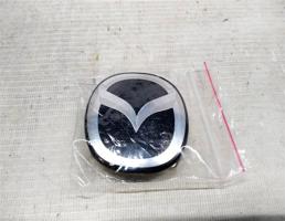 Эмблема с рулевого колеса для Mazda Tribute I (2000—2004)  запчасти бу