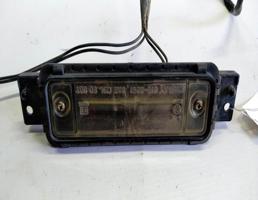 Фонарь подсветки номера для Mazda Millenia I рестайлинг (2000—2003)  запчасти бу