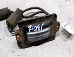 Фонарь подсветки номера для Nissan Maxima J30 (1988—1994)  запчасти бу