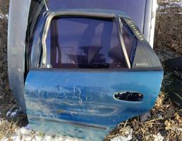 Дверь задняя левая для Toyota Corolla VI (1987—1993)  запчасти бу